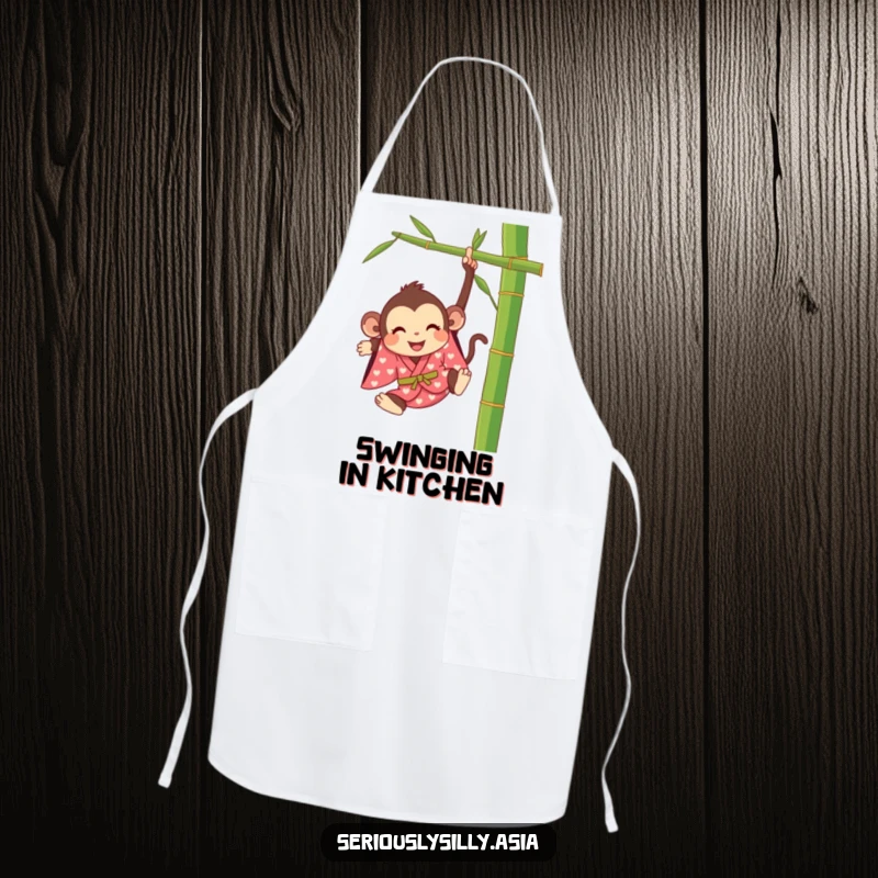 Funny apron with a happy cartoon monkey in a bright kimono, swinging from a bamboo stalk while cooking.