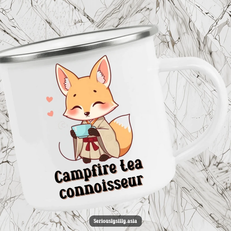 Funny camping mug featuring a smiling cartoon fox in a patterned kimono, elegantly sipping tea in an outdoor setting.