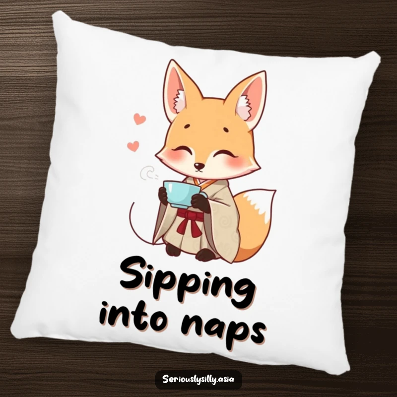 Funny pillow with a smiling cartoon fox wearing a patterned kimono, elegantly sipping tea, perfect for a chic accent.