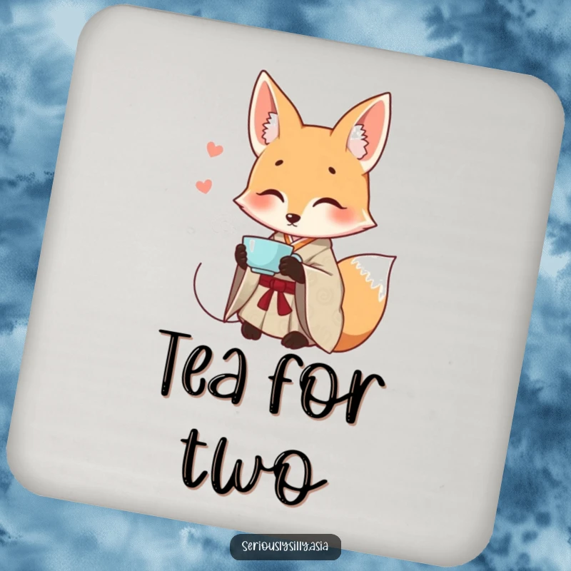 Funny drink coaster featuring a smiling cartoon fox in a patterned kimono, gracefully sipping tea.