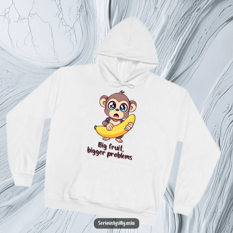 Funny Hoodie depicting a startled monkey bot holding a large, wobbly banana, ideal for cozy humor.