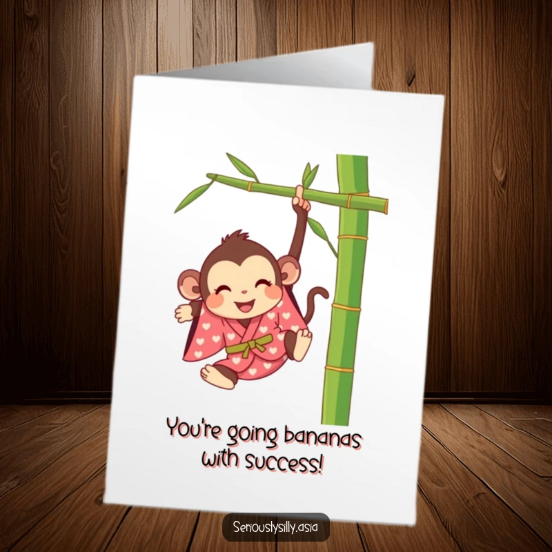 Funny Free Printable congratulations card featuring a joyful cartoon monkey in a kimono swinging energetically from bamboo.