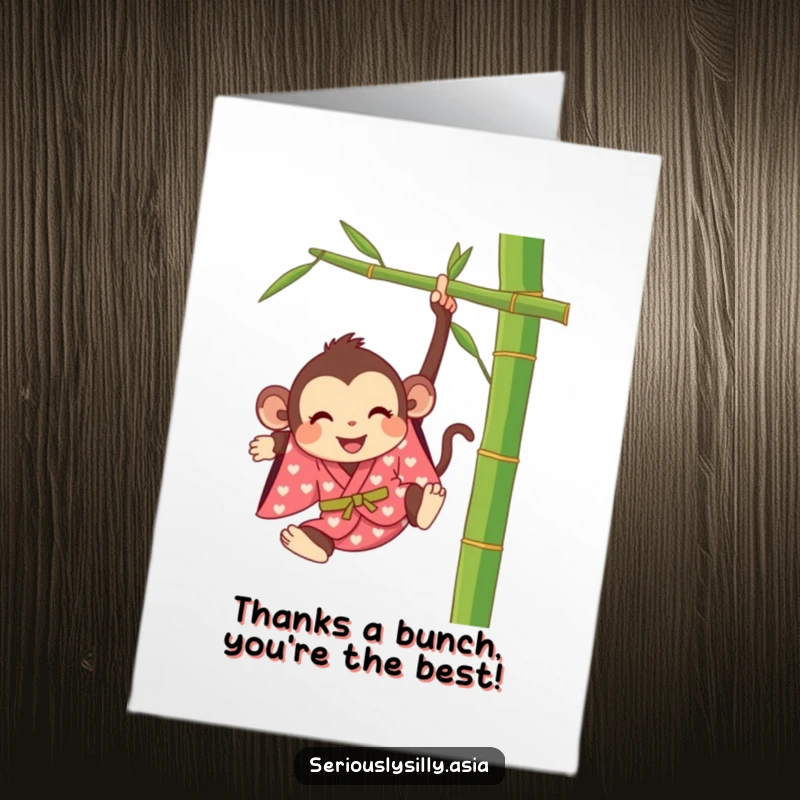 Funny Free Printable thank you card with a happy cartoon monkey in a kimono swinging from a bamboo stalk.