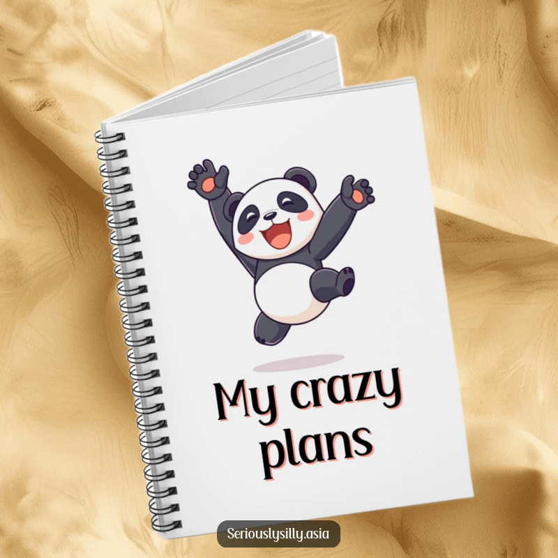 Funny delighted panda bot performing a somersault with legs in the air on the cover of a notebook, ideal for jotting fun ideas.