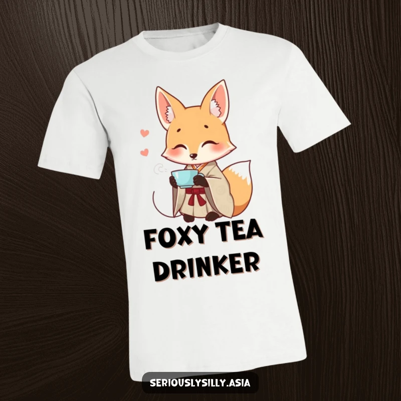 Funny t-shirt featuring a smiling cartoon fox in a patterned kimono, elegantly sipping tea with a contented look.